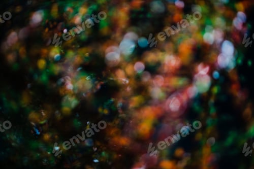 Preview: Blurred colorful light shining in dark