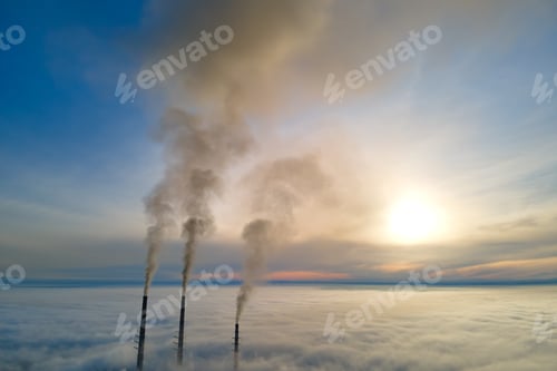 Preview: Coal power plant high pipes with black smoke moving upwards polluting atmosphere.