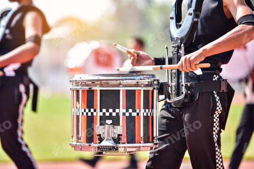 Preview: Close-up of marching band drummers marching