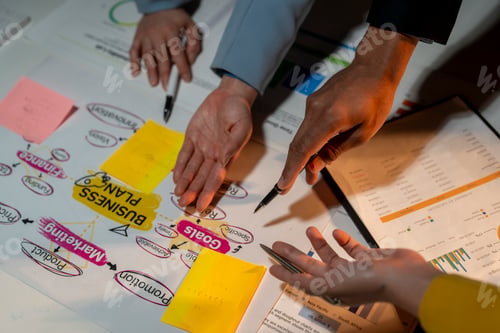 Preview: A group of people are working on a business plan