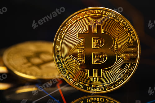 Preview: Gold bitcoin standing on financial charts for cryptocurrency prices