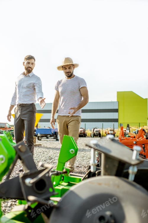 Preview: Agronomist with salesman at the agricultural shop