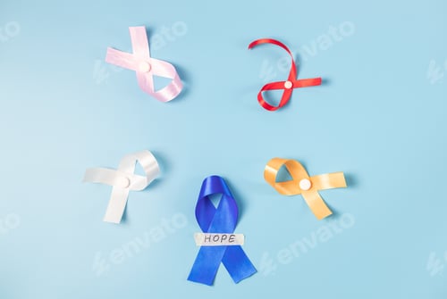 Preview: Five multi-colored emblem ribbons on a blue background.