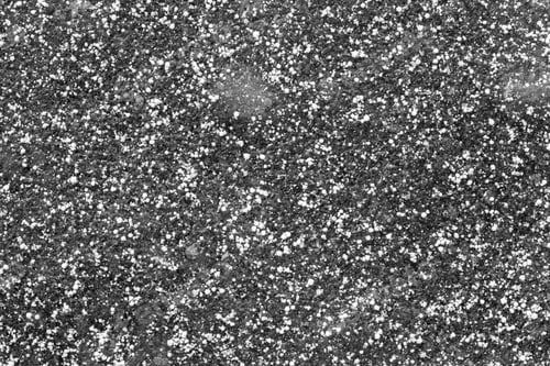 Preview: Abstract Texture Of The Frozen Asphalt With Ice Of Black Color And With White Grains Of Snow For A