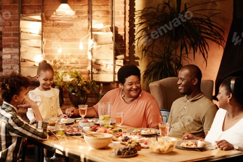 Preview: Happy African American Family Dining Together