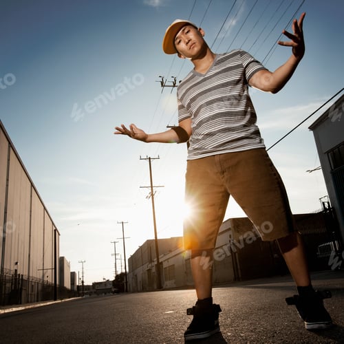 Preview: A young person with a boombox on the street of a city.
