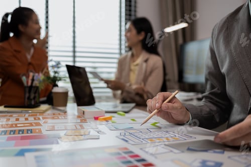 Preview: Creative Team Collaborating on User Interface Design