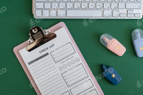 Preview: Colorful school supplies on a green background