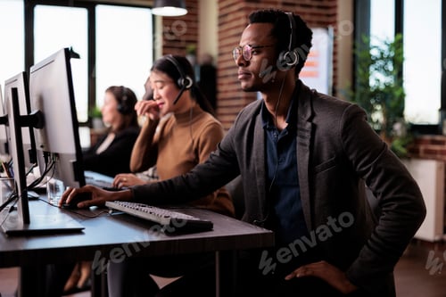 Preview: Operator answering client phone call at customer care service