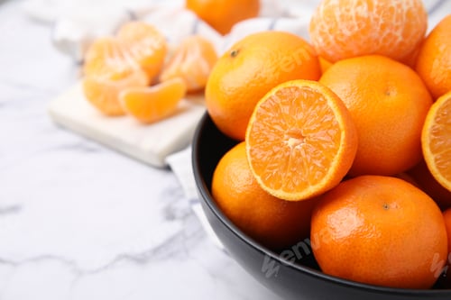 Preview: Fresh juicy tangerines on white marble table, closeup. Space for text
