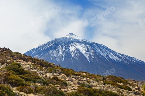 Preview: Landscape view of Mount Teide against blue cloudy sky