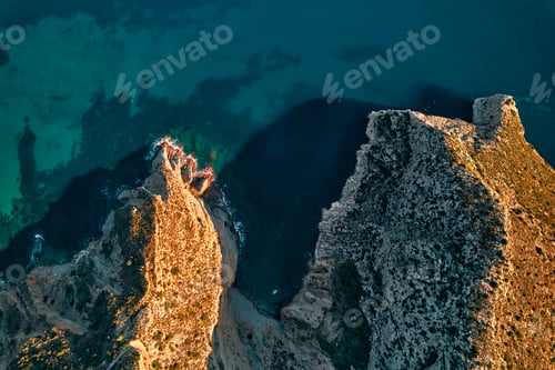 Preview: an aerial view of a cliff overlooking the ocean