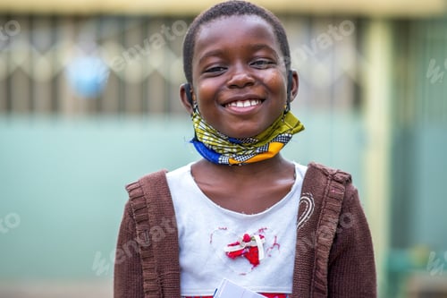 Preview: Closeup shot of a smiling black male child happiness concept