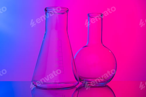 Preview: Chemical glassware close up on neon pink-purple background