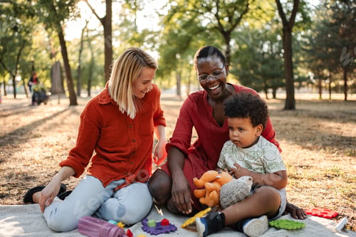 Preview: Happy Mothers Playing with their Baby in the Park
