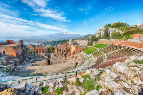 Preview: Ruins of ancient Greek theater in Taormina and Etna volcano in the backgroun