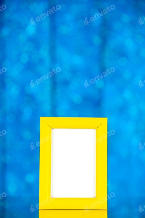 Preview: front view yellow picture frame on blue background portrait photo color shoot present family gift