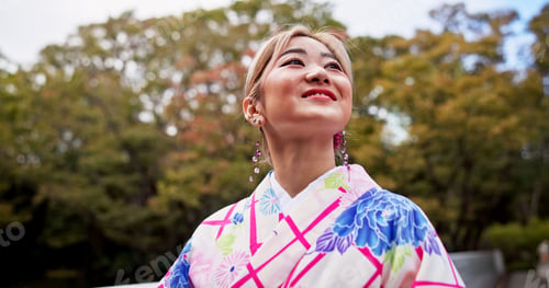 Preview: Happy, asian woman and dream with fashion in kimono for travel, ambition or sightseeing in nature.