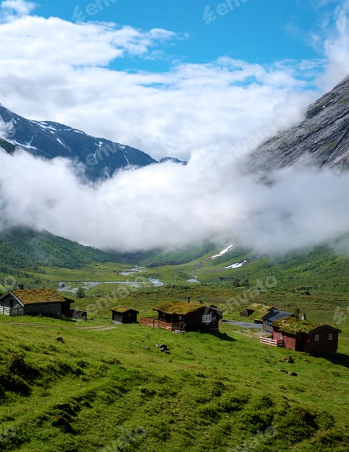 Preview: Norwegian Cabins Nestled in a Sea of Clouds
