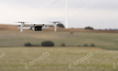 Preview: Closeup shot of flying drone with blue sky in the background