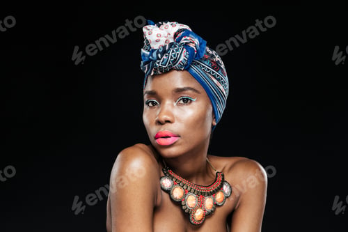 Preview: Close-up portrait of an african woman looking at camera