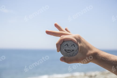 Preview: face painted on a stone