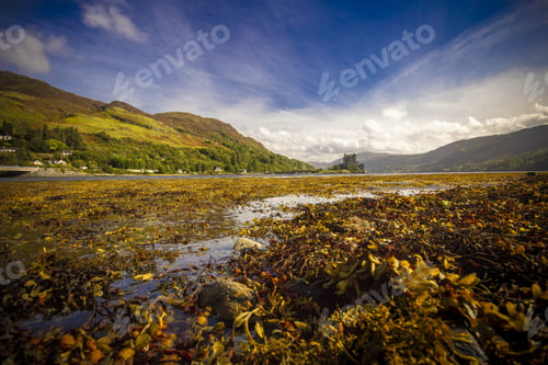 Preview: View of Eilean Donan Castle in Scotland surrounded by mountains