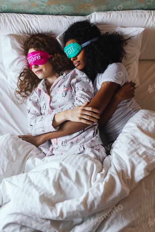 Preview: Girls relaxed sleeping in bed with blindfold at home
