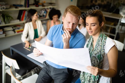 Preview: Creative business people working on business project