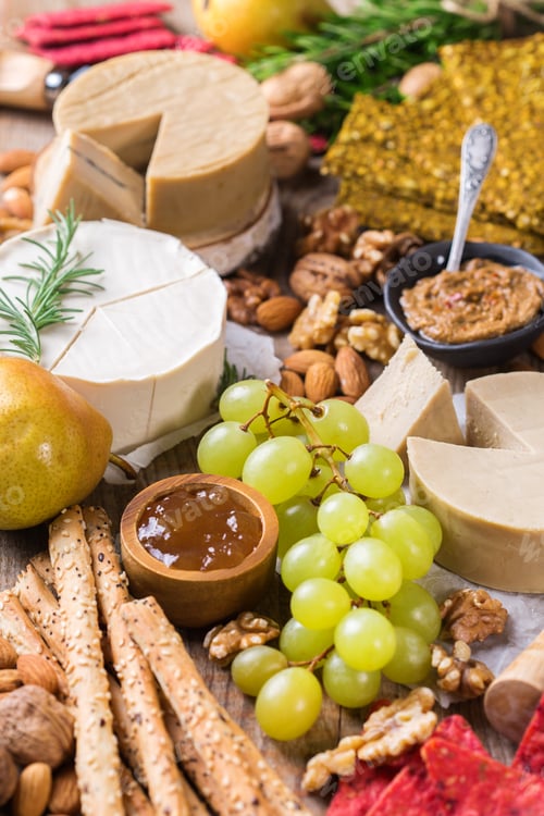 Preview: Plate of organic raw vegan cheese, snacks, nuts, fruits