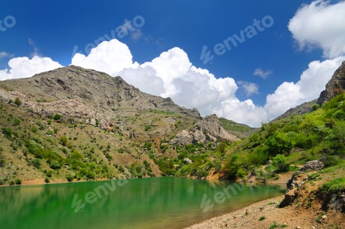 Preview: Mountain lake, large stone in foreground