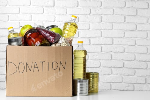 Preview: Donation box with various food. Pandemic support