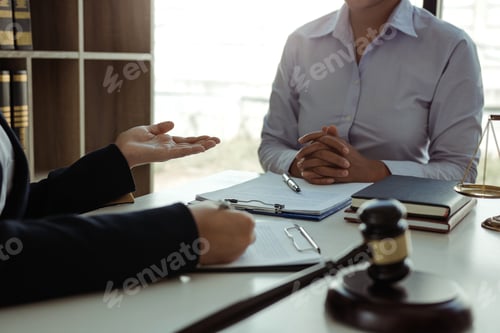 Preview: Lawyer is giving advice to clients who have consulted about legal issues