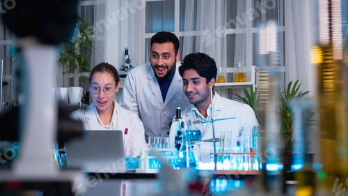 Preview: A group of young scientists are conducting experiments in the lab using a microscope.