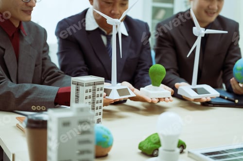 Preview: Three businessmen meet table to discuss the development of a clean energy and environmental city