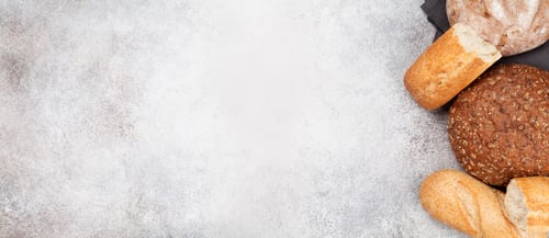Assortment of Bread on Textured Background