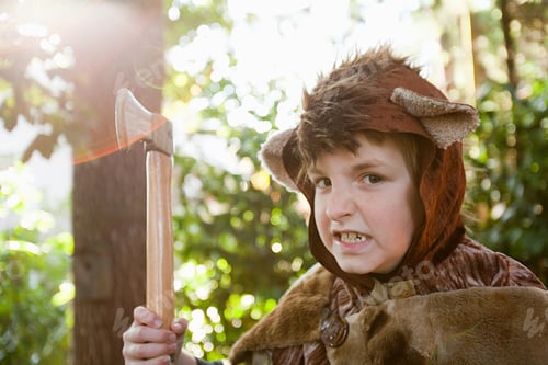 Preview: Boy dressed up as bear with toy axe