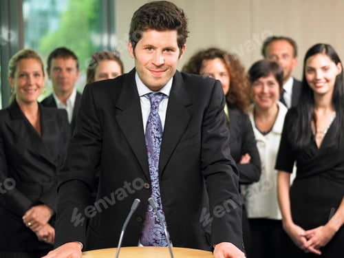 Preview: Business man giving a conference