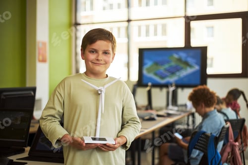 Preview: Caucasian Boy Presenting Wind Turbine Model during School Science Lesson