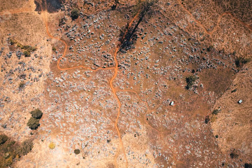 Preview: Rocks and farmland are dry during the hot summer days.