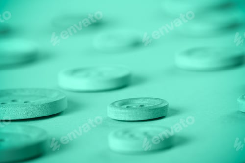 Preview: Wooden Buttons Lie On A Bright Background