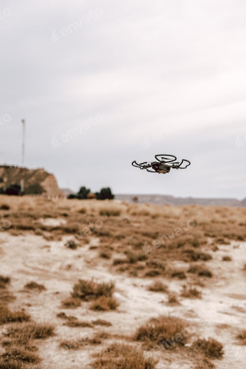 Preview: Drone flying over a desertic landscape