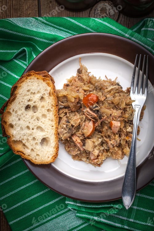 Preview: Traditional polish sauerkraut (bigos) with mushrooms and meat.