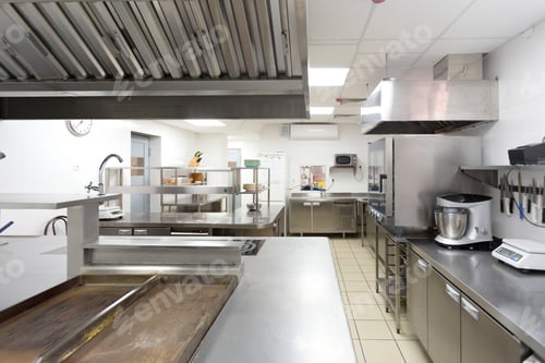 Preview: Large, modern kitchen with stainless steel equipment in a culinary workspace