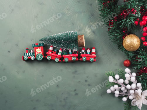 Preview: Christmas festive green background with toy train