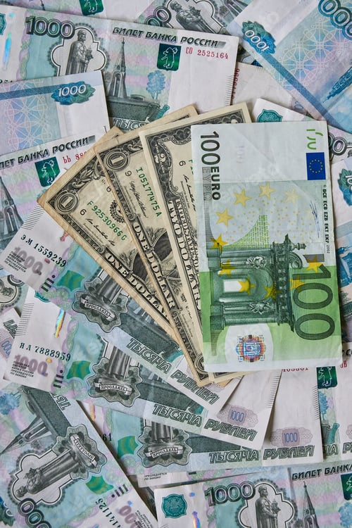 Preview: background of paper bills dollars, euros and rubles. Currency exchange rate