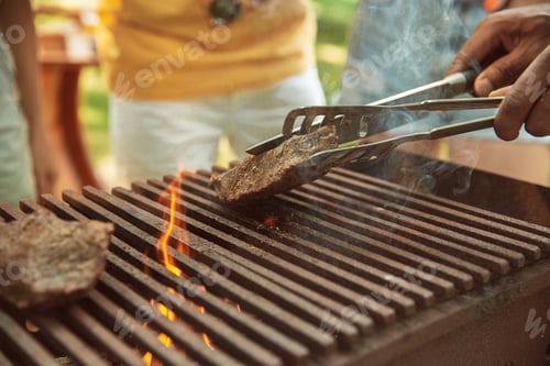 Preview: Close up of meat grilling, barbecue, summer lifestyle