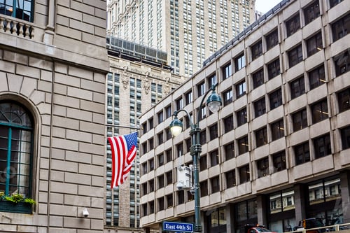 Preview: USA flag on building wall