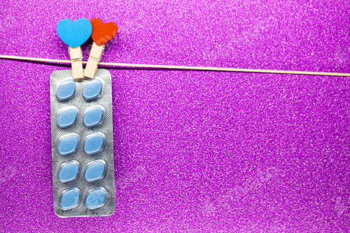 Preview: Pill for men's health and Valentine day background.