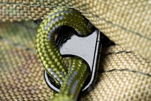 Preview: Close up still life of a green army tactical backpack